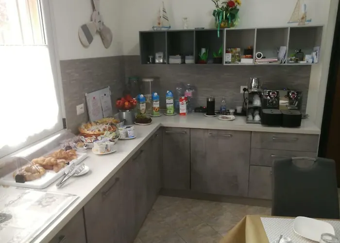 Scilla Resort לינה וארוחת בוקר 4*