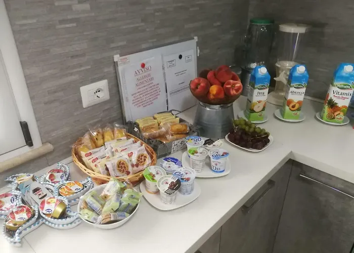 לינה וארוחת בוקר Scilla Resort 4*